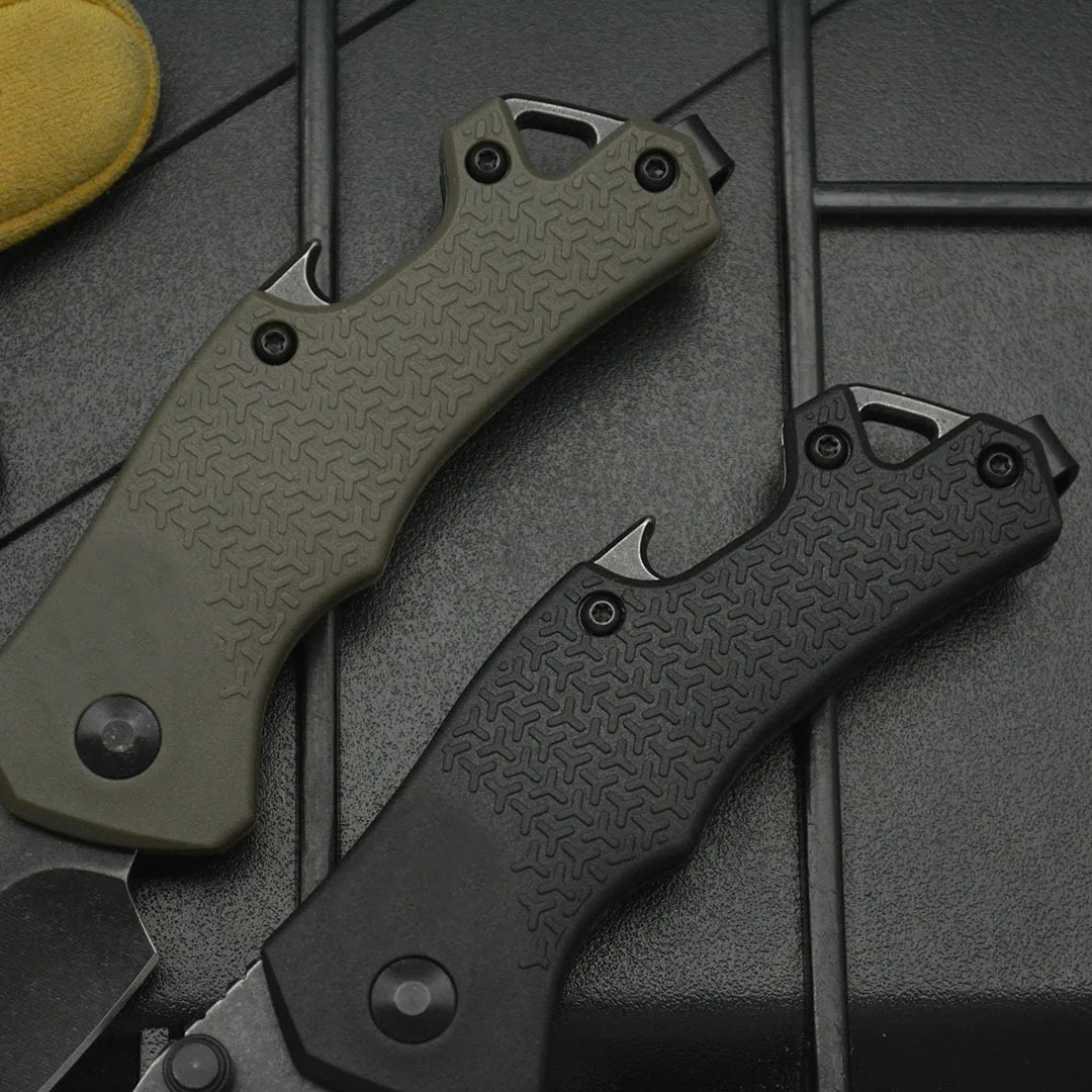 Close-up of two high hardness camping survival knife handles in green and black, showcasing textured grip design.