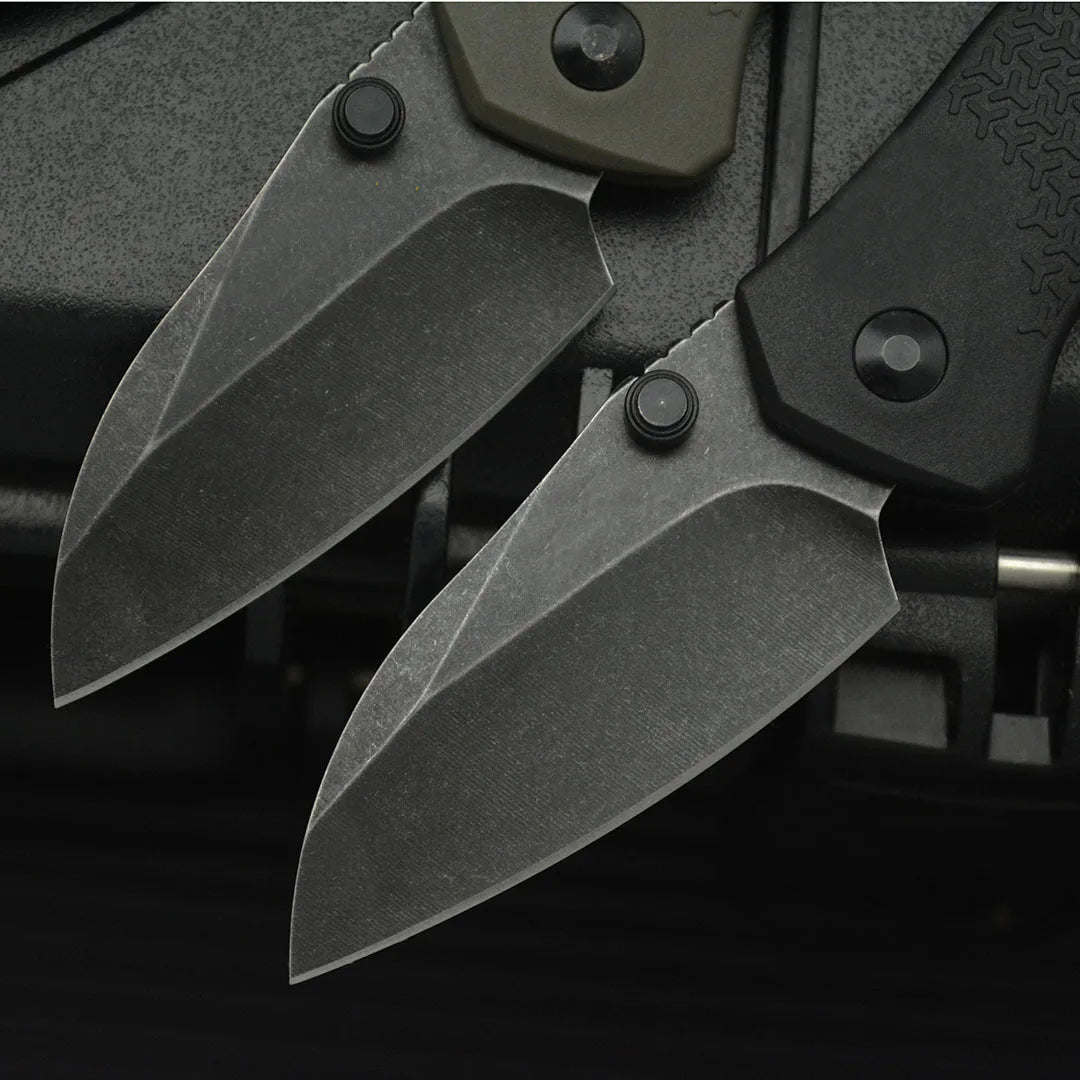 high hardness camping survival knife blades with sleek designs and durable materials on a dark background.
